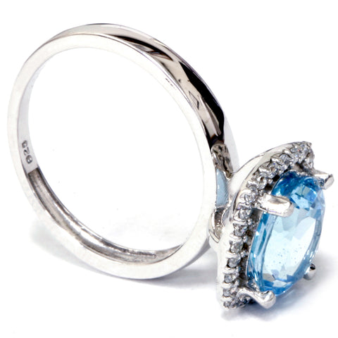 2ct Oval Blue Topaz and Natural Diamond Halo Ring 10K White Gold